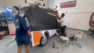 SigmaGrafix Installers wrapping a van